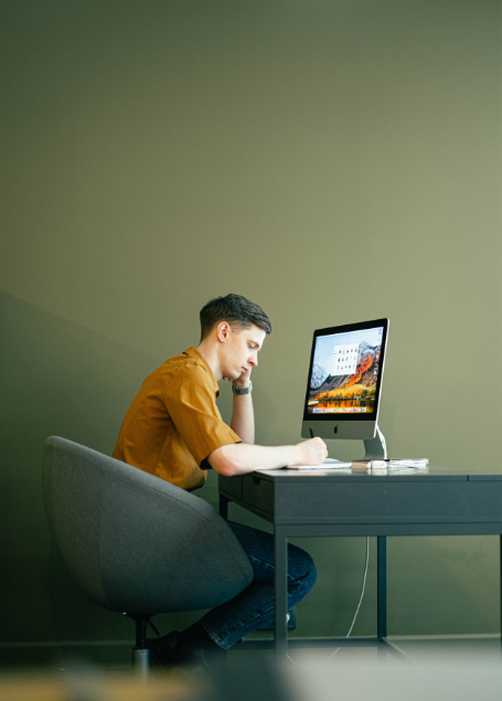 Professionals working in modern co-working space